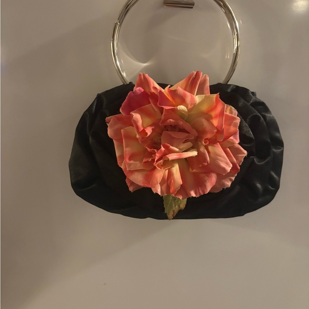 Chic Black Clutch with Vibrant Floral Accent